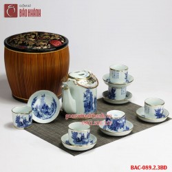 Bộ ấm chén tích men lam bọc đồng và giỏ ấm