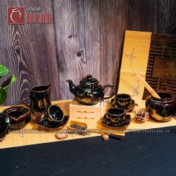 Bộ ấm chén Vinh Hoa Phú Quý men nâu đen vẽ vàng dáng quả hồng