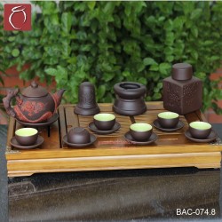 Bộ ấm chén tử sa đen đắp nổi hoa Phù Dung đỏ và phụ kiện