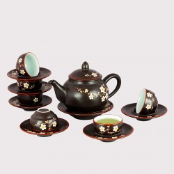 Bộ ấm chén tử sa lõm khắc hoa Đào
